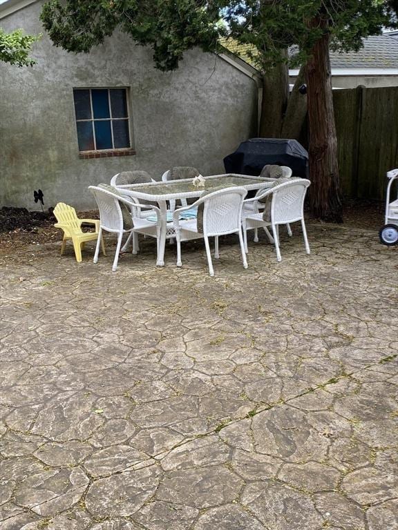 452 W Clinton St, New Bedford, MA 02740 - view of patio featuring outdoor dining area and fence