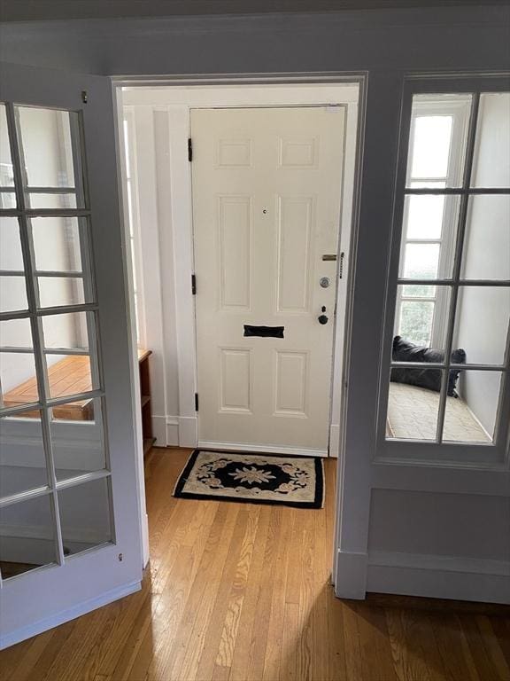 452 W Clinton St, New Bedford, MA 02740 - entryway with wood finished floors and baseboards