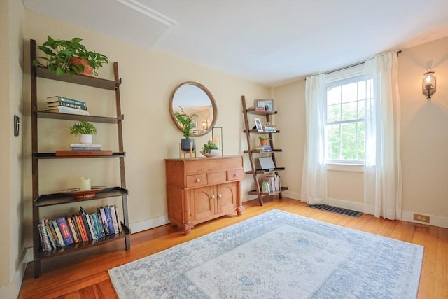 21 Witherell Pl, Plainville, MA 02762 - living area featuring wood finished floors and baseboards
