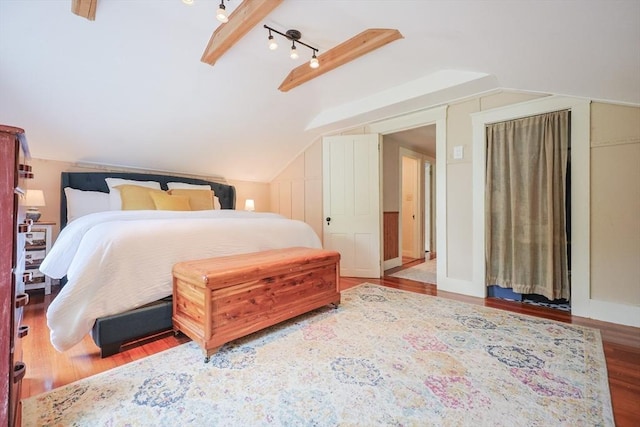 21 Witherell Pl, Plainville, MA 02762 - bedroom with lofted ceiling, wood finished floors, and track lighting