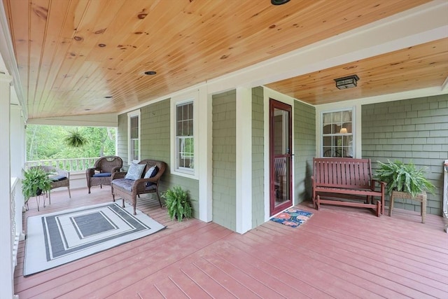 21 Witherell Pl, Plainville, MA 02762 - wooden porch featuring an outdoor living space