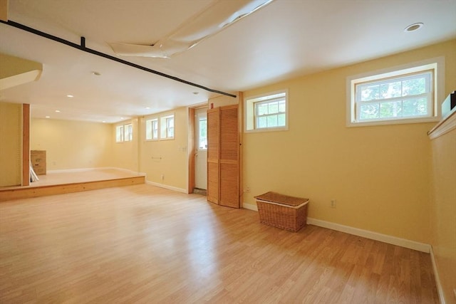 21 Witherell Pl, Plainville, MA 02762 - below grade area featuring light wood-style flooring, baseboards, and recessed lighting