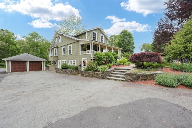21 Witherell Pl, Plainville, MA 02762 - view of property exterior with a detached garage, an outbuilding, and a porch