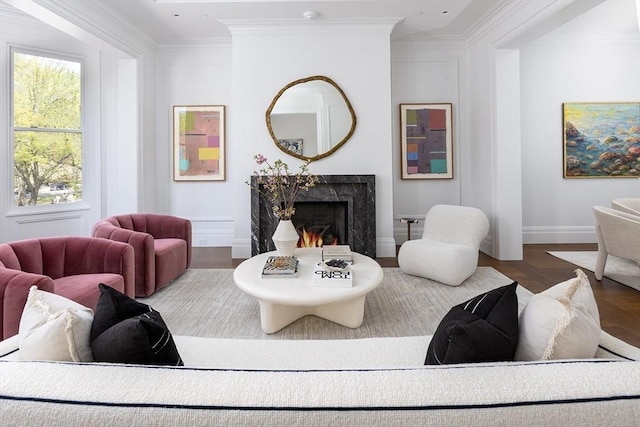 240 Commonwealth Ave Unit 2, Boston, MA 02116 - living area with baseboards, a high end fireplace, wood finished floors, and ornamental molding