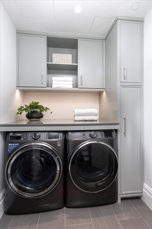 240 Commonwealth Ave Unit 2, Boston, MA 02116 - laundry area with independent washer and dryer and cabinet space