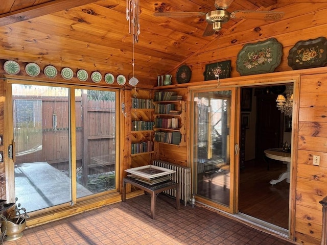 sunroom with wood ceiling, ceiling fan, radiator heating unit, and vaulted ceiling