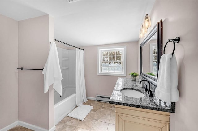 bathroom featuring a baseboard radiator, baseboards, shower / bath combination with curtain, and vanity