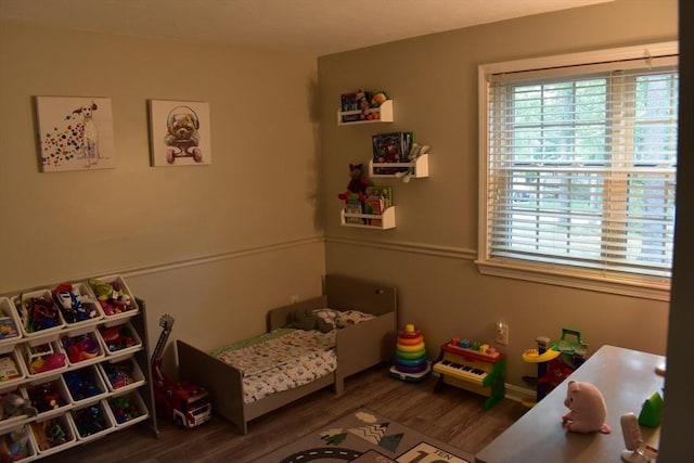 16 Sherborne Cir, Ashland, MA 01721 - bedroom featuring wood finished floors, multiple windows, and baseboards