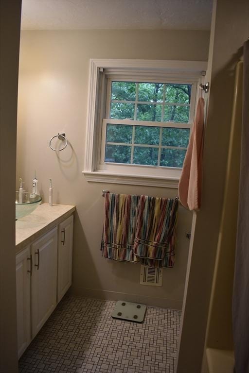 16 Sherborne Cir, Ashland, MA 01721 - bathroom featuring vanity and baseboards