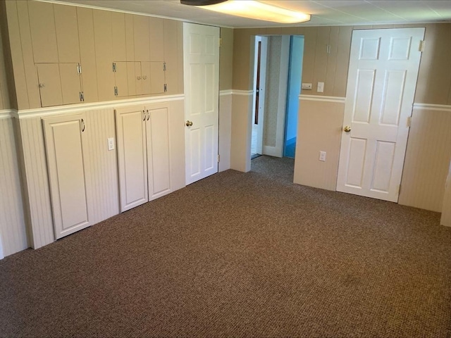 unfurnished bedroom with carpet flooring