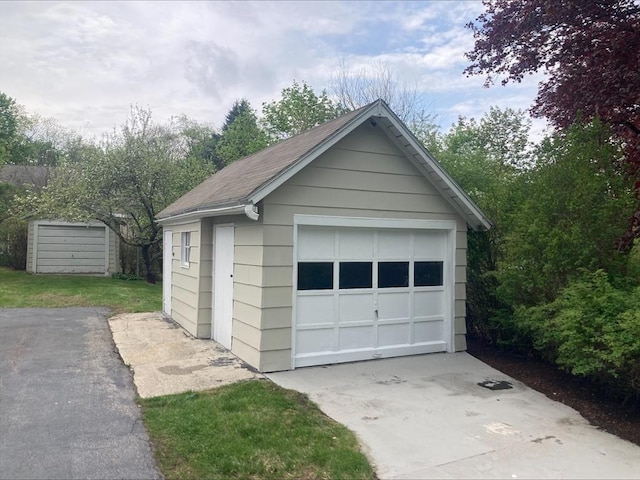 detached garage with driveway