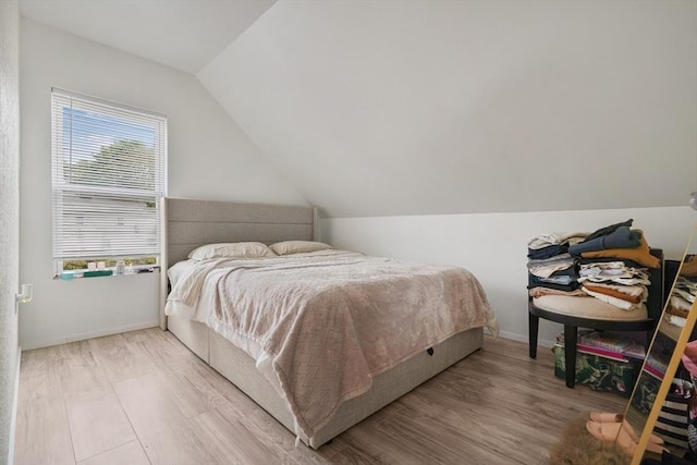 32 Slater St, Fall River, MA 02720 - bedroom with lofted ceiling and wood finished floors