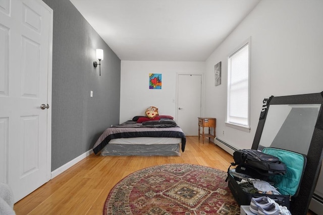 32 Slater St, Fall River, MA 02720 - bedroom featuring light wood finished floors and baseboard heating