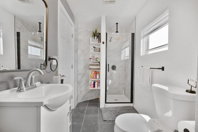 32 Slater St, Fall River, MA 02720 - bathroom with vanity, a shower stall, and tile patterned flooring