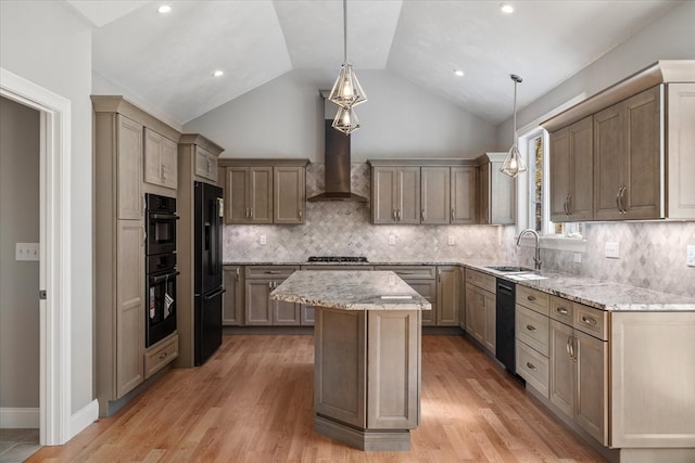 kitchen featuring a kitchen island, sink, lofted ceiling, hanging light fixtures, and black appliances