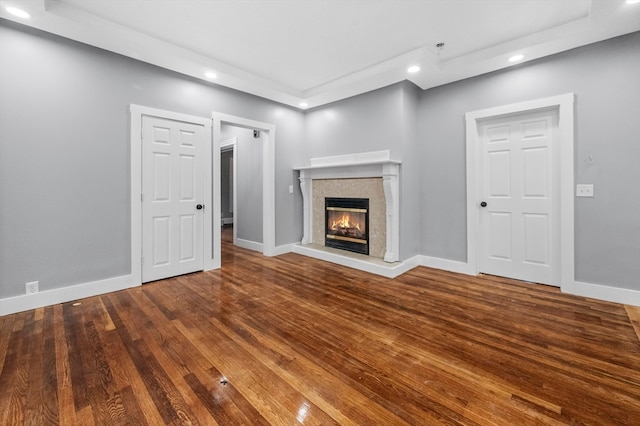 unfurnished living room featuring hardwood / wood-style floors