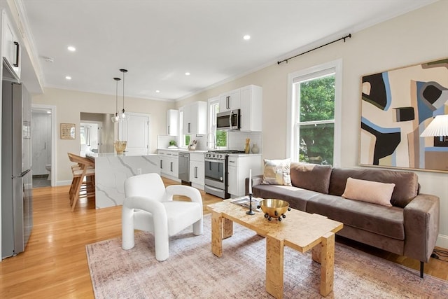 34 Leniston St Unit 2, Boston, MA 02131 - living area with light wood-type flooring, ornamental molding, recessed lighting, and baseboards