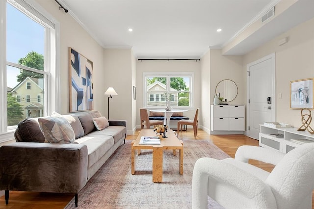 34 Leniston St Unit 2, Boston, MA 02131 - living area featuring light wood-style floors, ornamental molding, recessed lighting, and baseboards