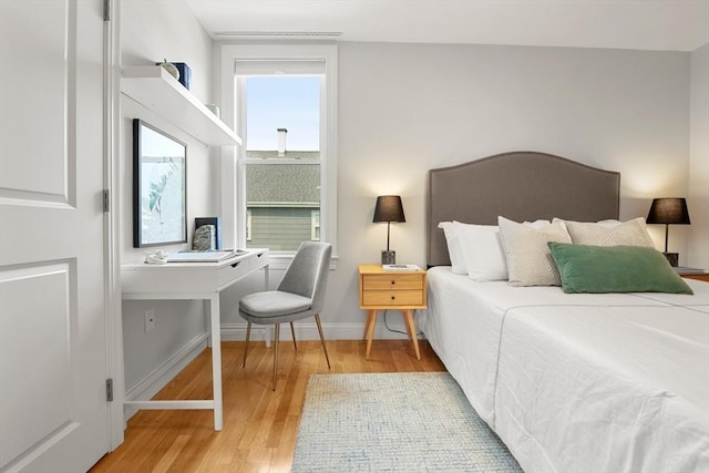 34 Leniston St Unit 2, Boston, MA 02131 - bedroom featuring wood finished floors and baseboards