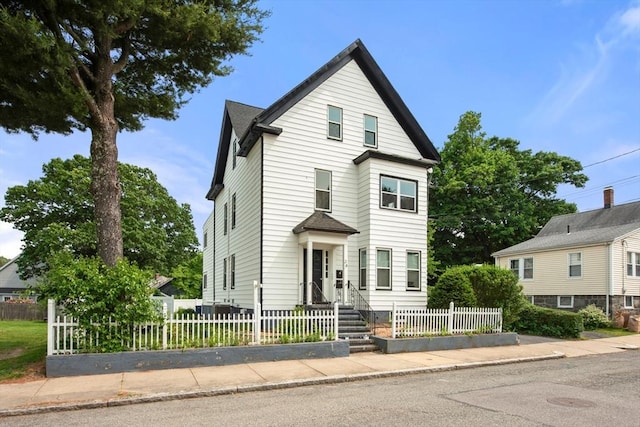 34 Leniston St Unit 2, Boston, MA 02131 - view of front of home with a fenced front yard