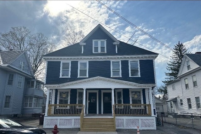 27 Burtt St, Lowell, MA 01851 - view of front of property with a porch