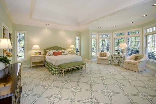 bedroom with a tray ceiling, carpet floors, crown molding, baseboards, and recessed lighting