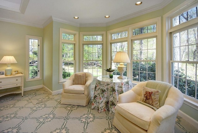 sunroom / solarium with baseboards, ornamental molding, and recessed lighting