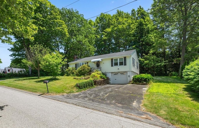 22 Edgewood Ave, West Boylston, MA 01583 - split foyer home with driveway, a garage, and a front lawn