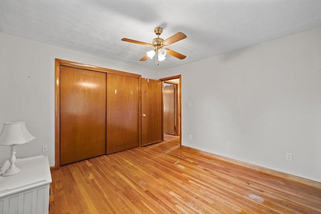 22 Edgewood Ave, West Boylston, MA 01583 - unfurnished bedroom with light wood-type flooring, a closet, and a ceiling fan