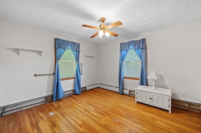 22 Edgewood Ave, West Boylston, MA 01583 - unfurnished room featuring healthy amount of natural light, ceiling fan, and light wood-style floors