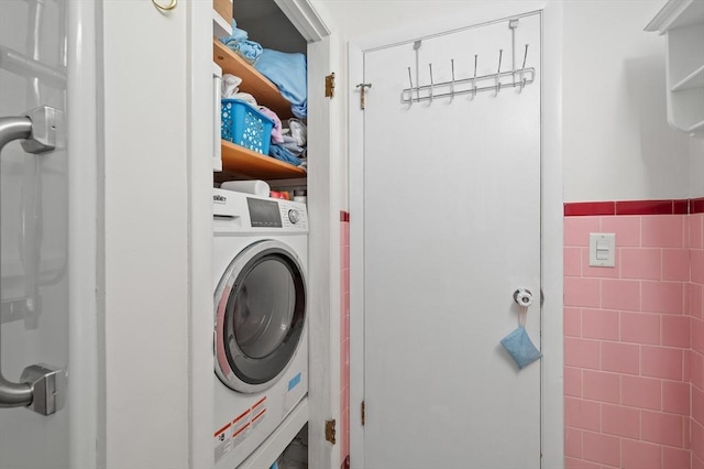 22 Edgewood Ave, West Boylston, MA 01583 - washroom featuring washer / clothes dryer, tile walls, and wainscoting
