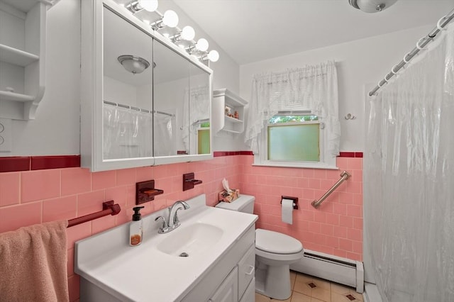 22 Edgewood Ave, West Boylston, MA 01583 - full bathroom featuring a baseboard radiator, vanity, tile walls, tile patterned floors, and a wainscoted wall