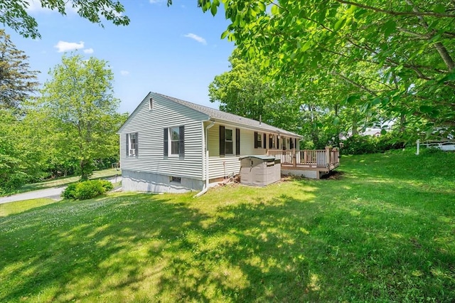 22 Edgewood Ave, West Boylston, MA 01583 - view of front of home with a wooden deck and a front yard