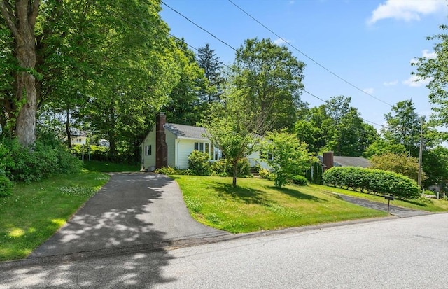 22 Edgewood Ave, West Boylston, MA 01583 - view of front of property with driveway and a front yard