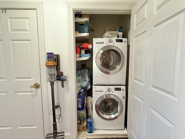 300 Allston St Unit 511, Boston, MA 02135 - laundry room featuring stacked washer / dryer