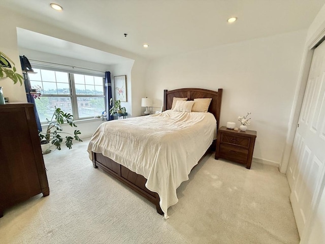 300 Allston St Unit 511, Boston, MA 02135 - bedroom with light colored carpet, recessed lighting, baseboards, and a closet