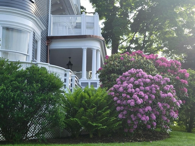 view of property exterior with a balcony