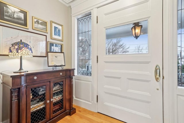 doorway with light wood-type flooring