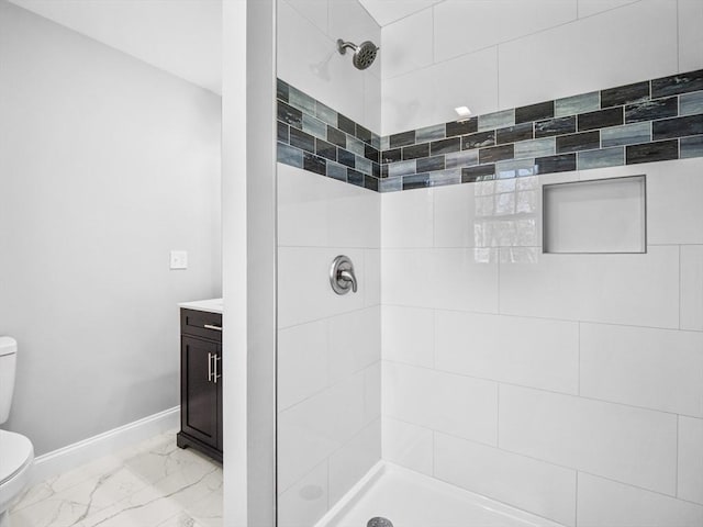 310 Old Westport, Dartmouth, MA 02747 - full bathroom featuring toilet, tiled shower, marble finish flooring, baseboards, and vanity