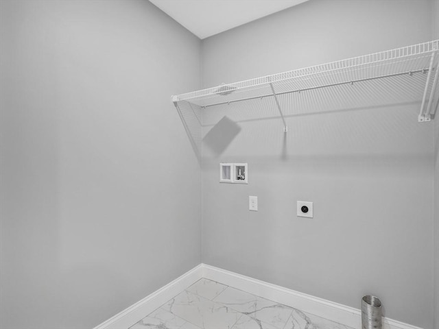 310 Old Westport, Dartmouth, MA 02747 - washroom with hookup for an electric dryer, hookup for a washing machine, light marble finish flooring, and baseboards