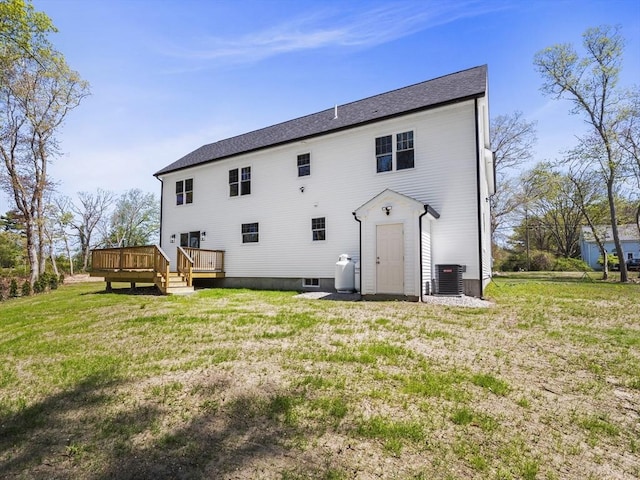 310 Old Westport, Dartmouth, MA 02747 - rear view of house with a wooden deck, a yard, and cooling unit