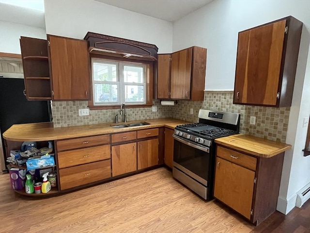 20 Cross St, Salem, MA 01970 - kitchen featuring gas range, open shelves, freestanding refrigerator, light countertops, and light wood-type flooring