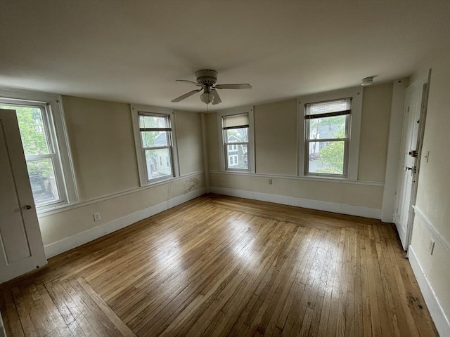 20 Cross St, Salem, MA 01970 - empty room featuring wood-type flooring and a ceiling fan