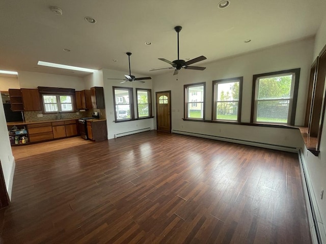 20 Cross St, Salem, MA 01970 - unfurnished living room with a baseboard heating unit, wood finished floors, a ceiling fan, and recessed lighting