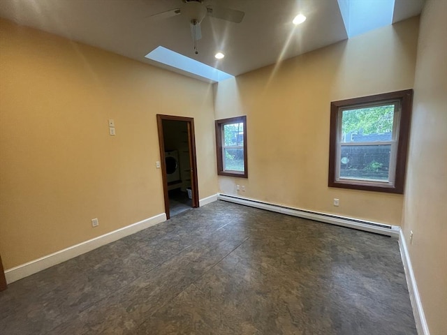 20 Cross St, Salem, MA 01970 - empty room with ceiling fan, a baseboard heating unit, a skylight, healthy amount of natural light, and recessed lighting