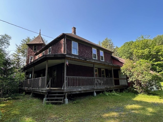270 Holtshire Rd, Orange, MA 01364 - back of property with a porch, a chimney, and a lawn