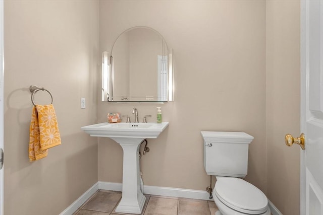 6 Bishop Ln, Middleton, MA 01949 - bathroom with toilet, tile patterned flooring, and baseboards