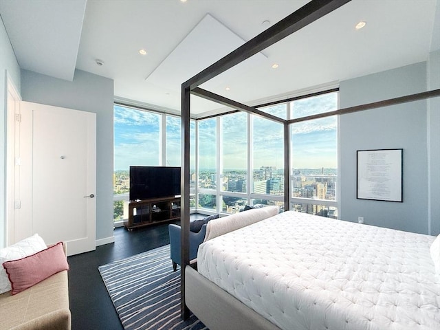 188 Brookline Ave Unit Ph29A, Boston, MA 02215 - bedroom with a wall of windows, wood finished floors, and recessed lighting