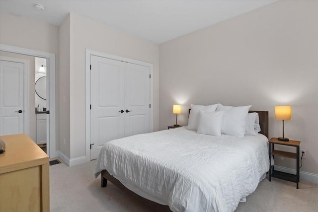 27 Sophia Dr, Rehoboth, MA 02769 - bedroom featuring light colored carpet, a closet, and baseboards