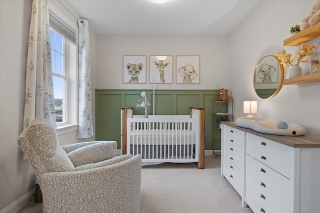 27 Sophia Dr, Rehoboth, MA 02769 - bedroom with multiple windows, light colored carpet, and a decorative wall